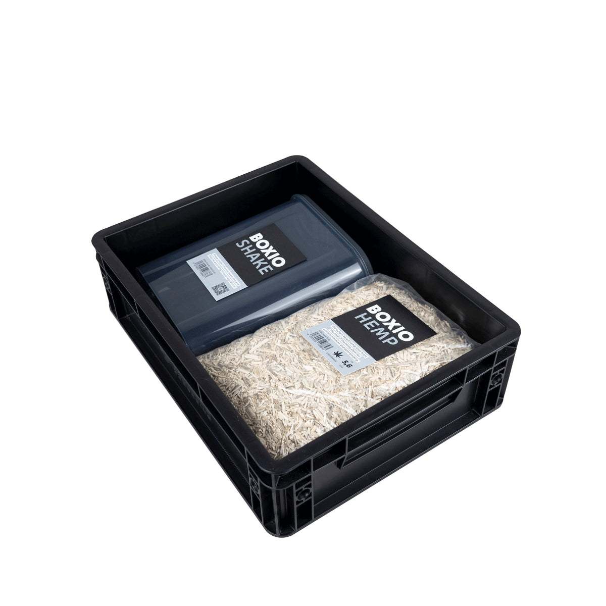 Schwarze Box mit zwei Fächern: eines enthält Hanffasern, das andere eine graue Dose "BOXIO SHAKE".