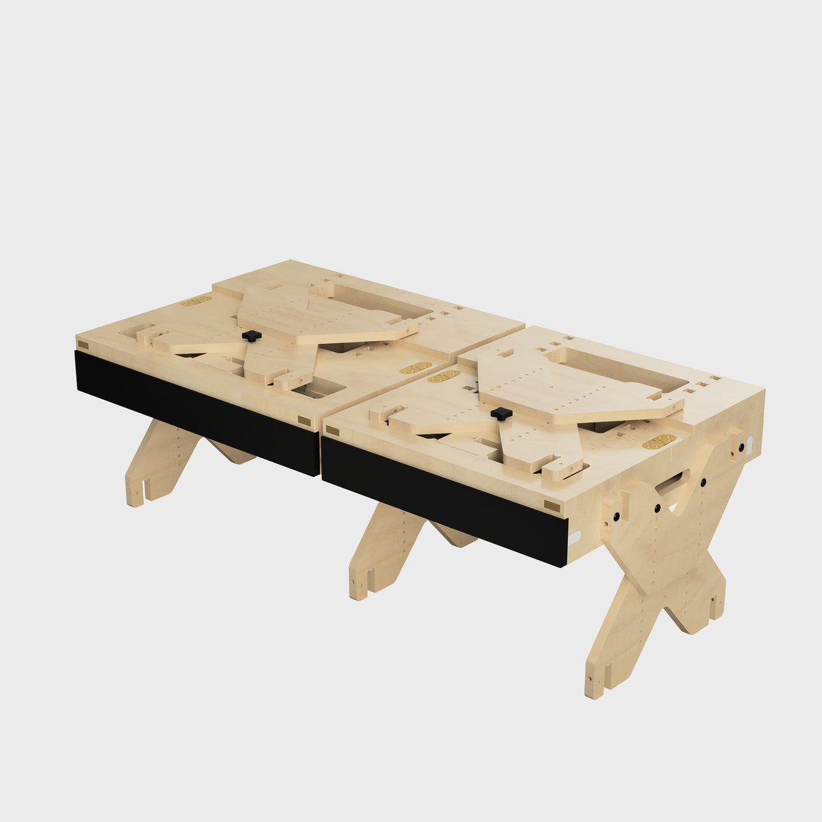 Modularer Holztisch mit zwei separaten Tischplatten und schwarzem Unterbau, ideal für kreative Projekte.