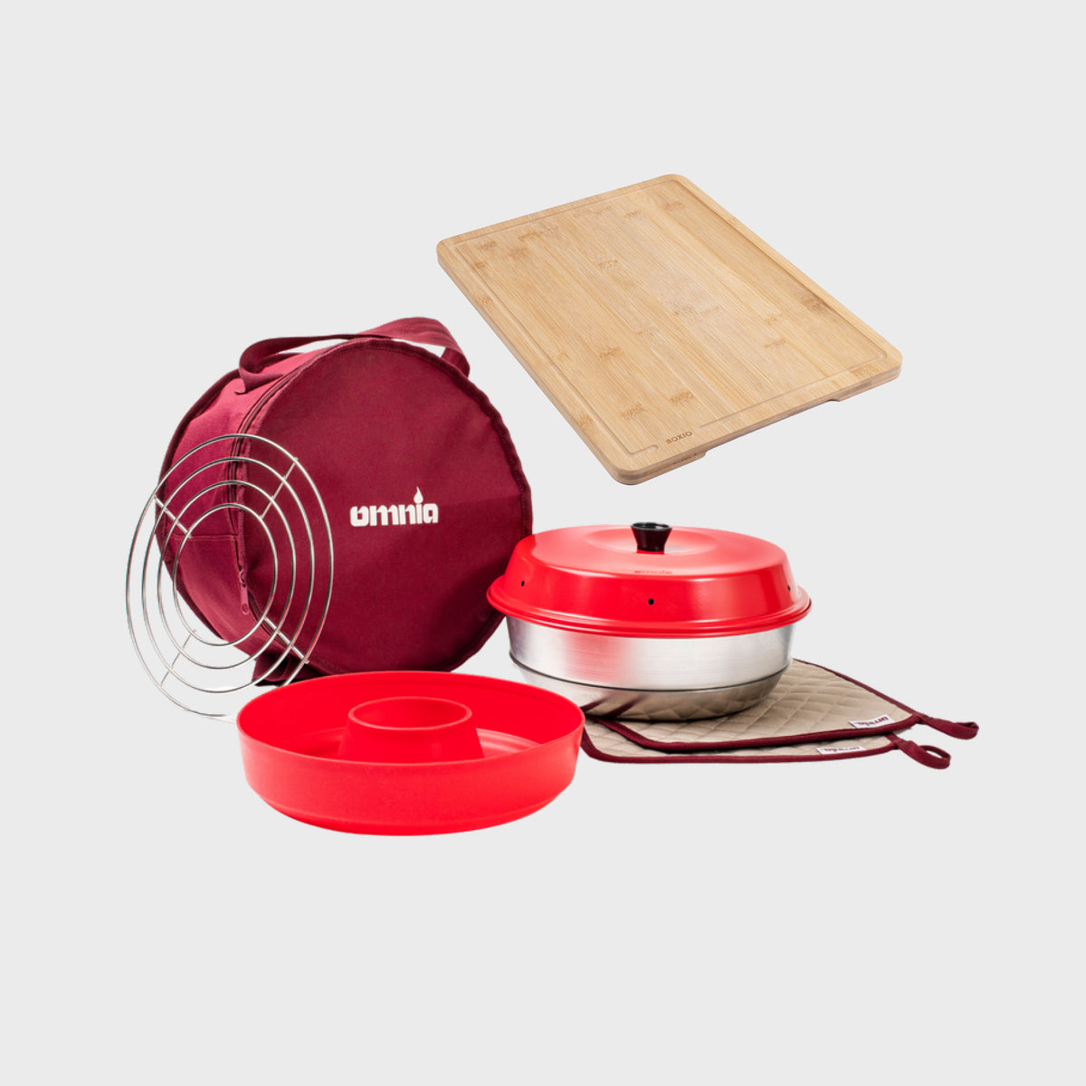 Kochset mit rotem Backofen, Silikonform, Bambuschneidbrett und einem Tasche für Camping und Outdoor-Kochen.