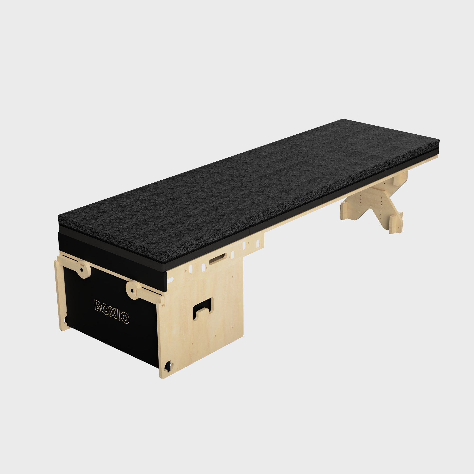 Moderne, stylische Liege mit schwarzer Polsterung und Holzgestell in minimalistischer Bauweise. Ideal für Behandlungen.