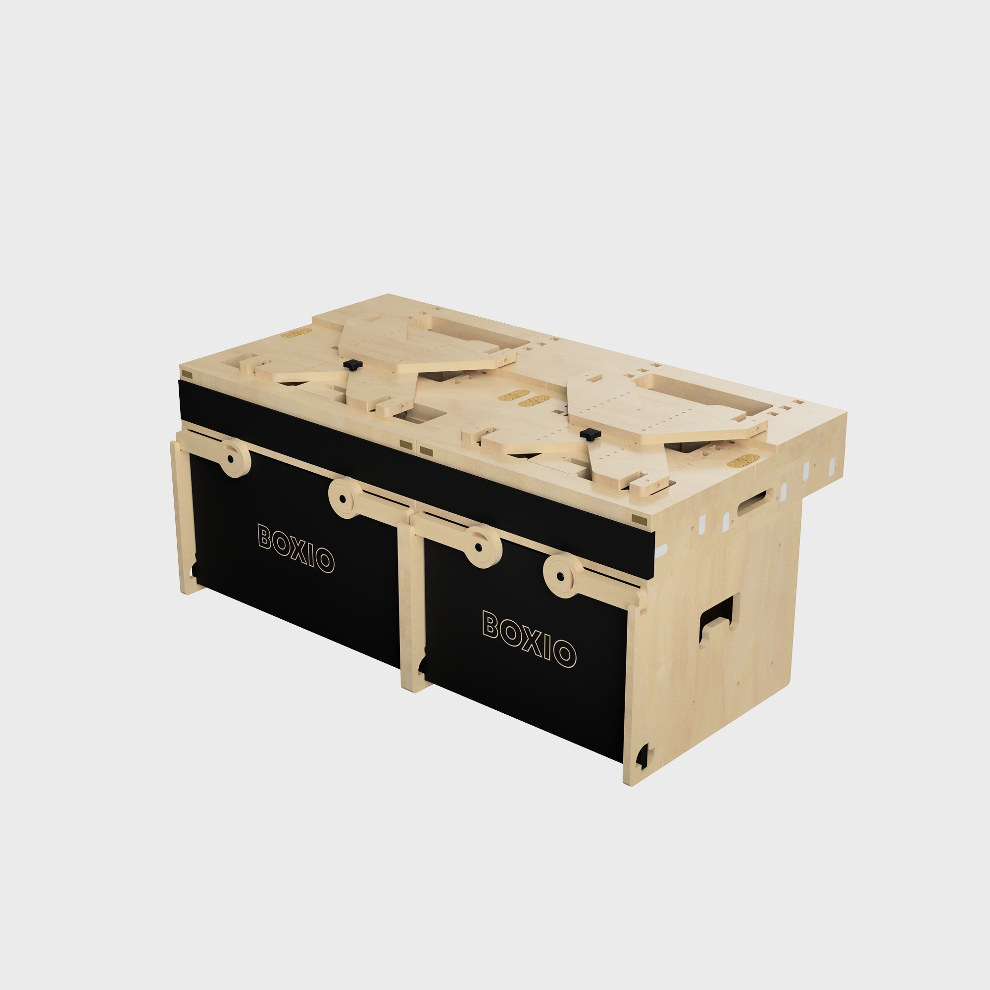 Modulares Aufbewahrungsmöbel aus Holz mit schwarzen Fronten, ideal für kreative Organisation.