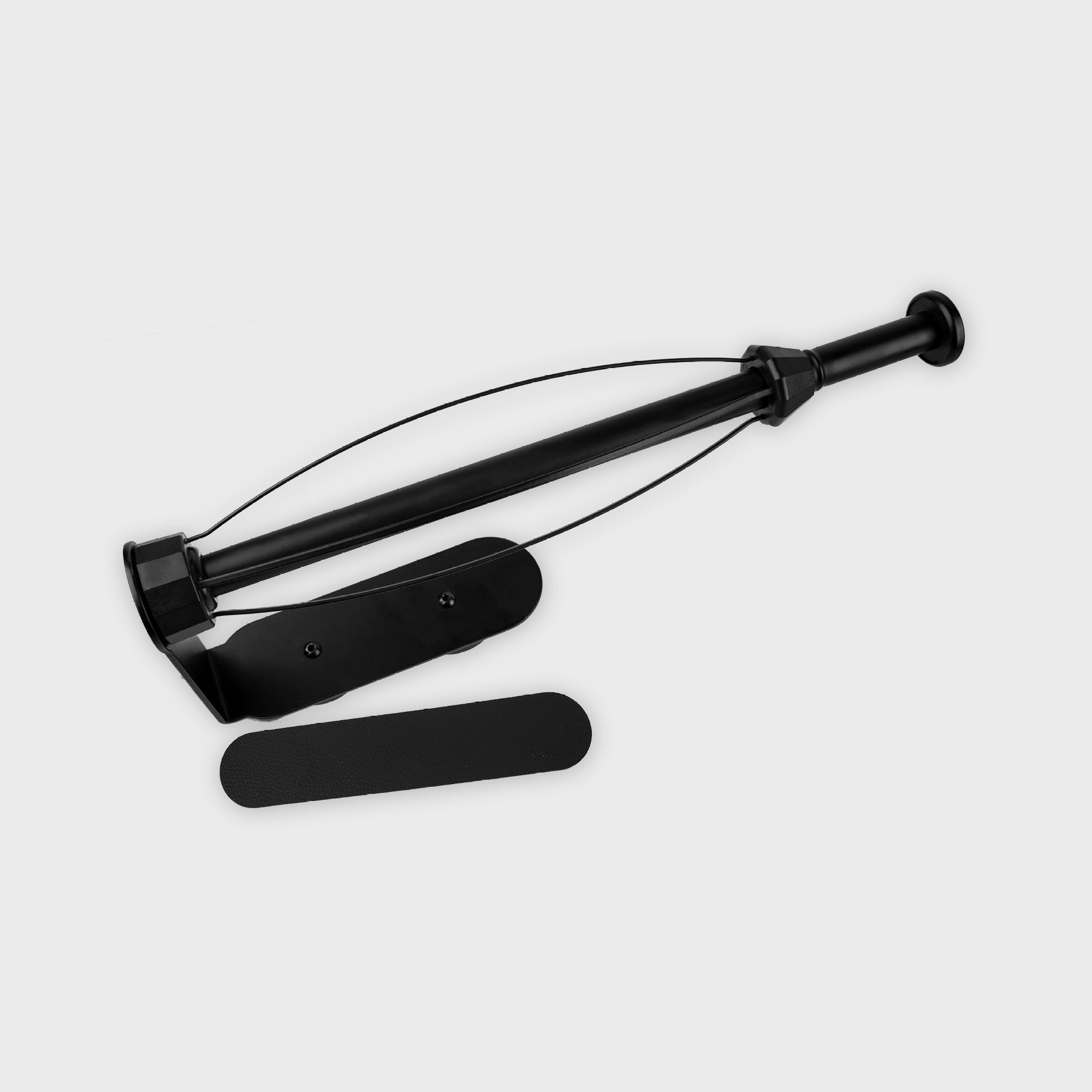 Schwarzes, ergonomisches Gerät mit flexiblen Komponenten, geeignet für orthopädische Anwendungen und Rehabilitation.