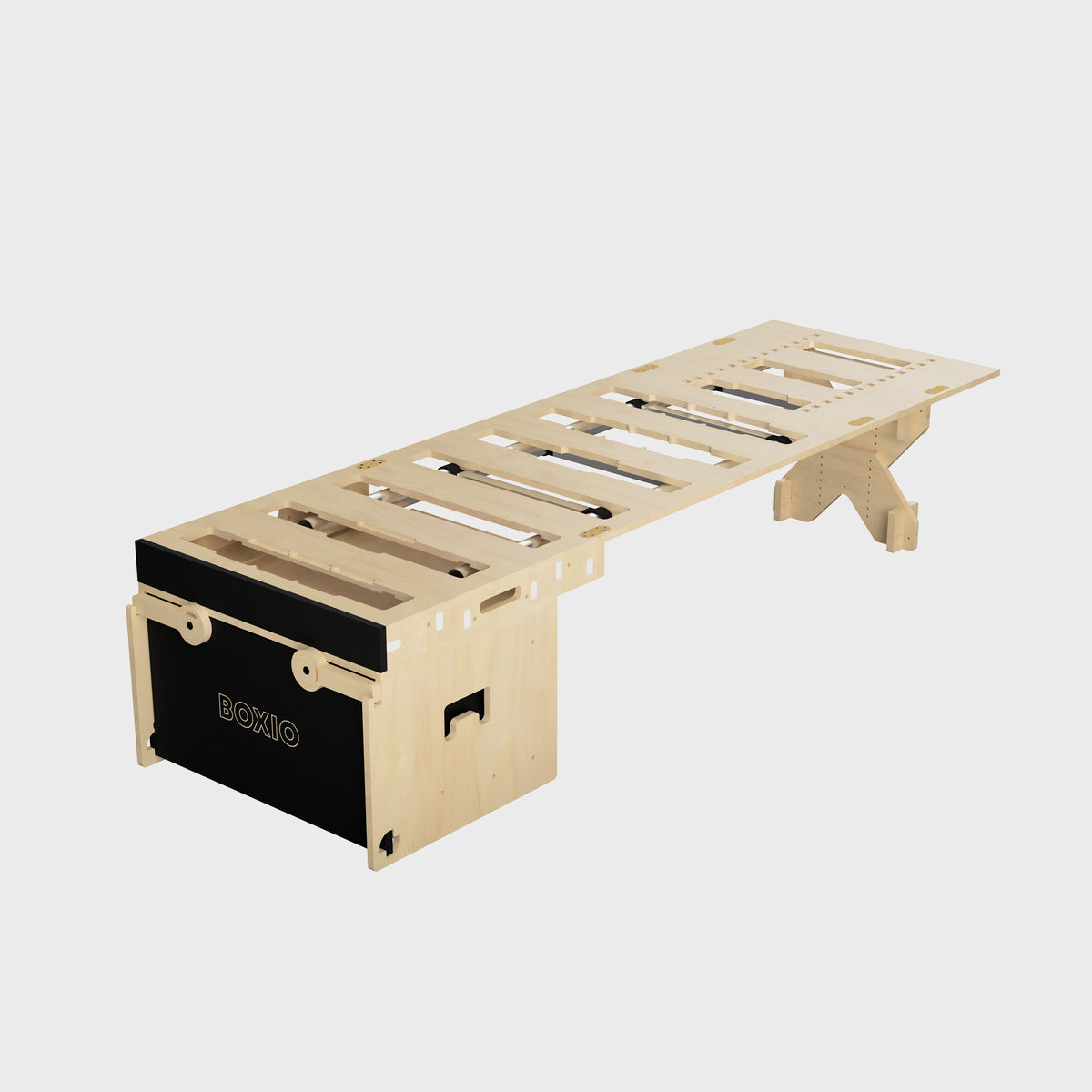 Modulares Möbelstück aus Holz mit Stauraum und klappbarem Tisch. Ideal für flexible Raumgestaltungen.