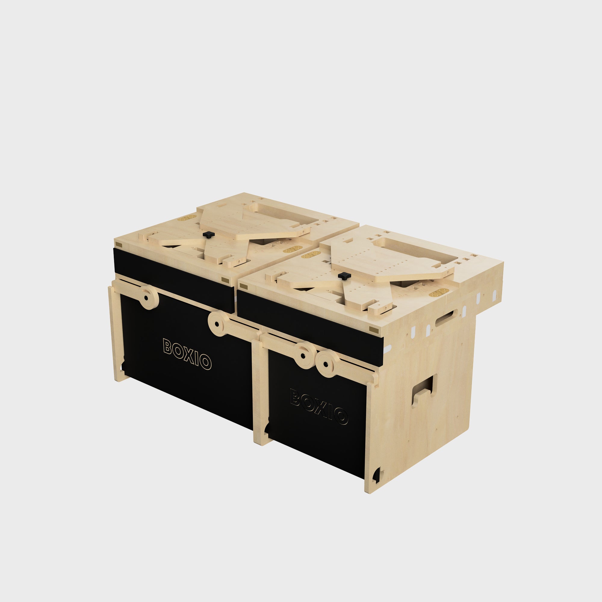Modulare Holzboxen in hellem Holz mit schwarzen Seitenteilen, ideal für Aufbewahrung und Organisation.